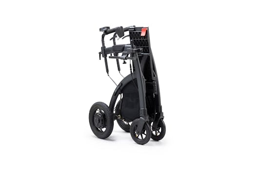 A compact, foldable electric wheelchair on a clean white background, ideal for mobility solutions.